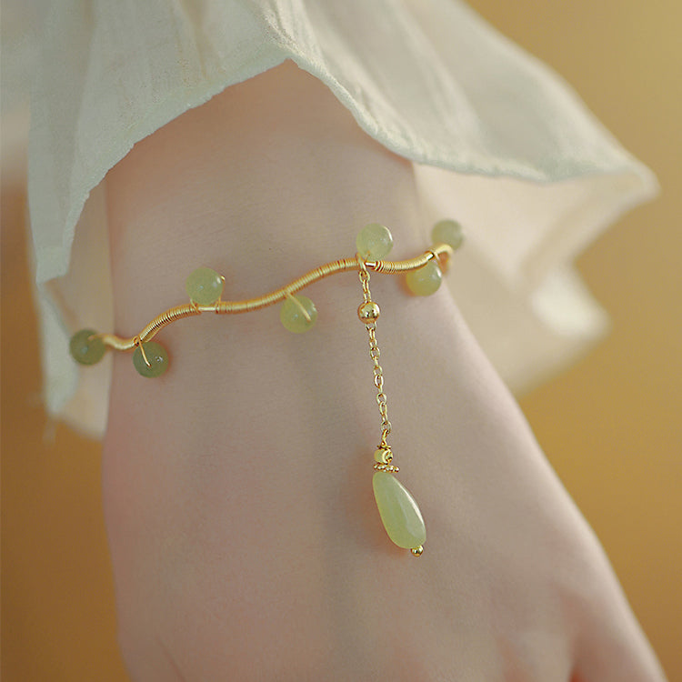 Qingti-Hetian Jade Bracelets Amber NG
