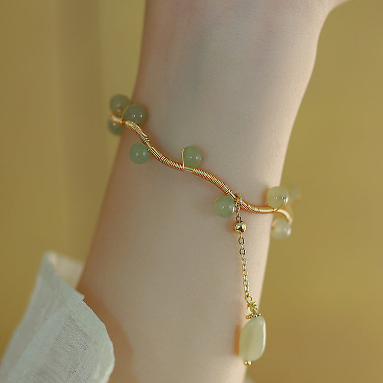 Qingti-Hetian Jade Bracelets Amber NG