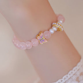 Peach Blossom Whispers - Butterfly and Pearl Charm Bracelet